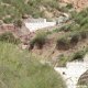 Series of check dams in a small drainage line on a hillslope (© Joris de Vente 2007)