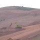 Large-scale land preparation for housing near the small, traditional village of Aledo (© Joris de Vente 2007)