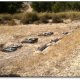 <p>Storage tanks (left) and runoff collectors on adjacent open plots (upstream to the right).</p>