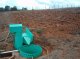 One of the plots with the flume and the two tanks to catch the runoff and transported sediments (photo: C. Prat)