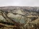 <p>Badlands subjected to high erosion rates, Messara valley, Crete (© C. Kosmas, 2008)</p>